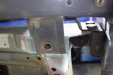 Close-up shot of Rust Buster Rear Crossmember For 1997-2006 Jeep Wrangler RB4022 installed to the frame rail
