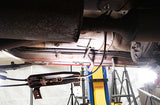 View from beneath one Rust Buster Center Unibody Stiffener For 1984-2001 Jeep Cherokee RB6061, installed to the frame rail