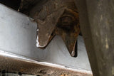 Close-up shot of the mount cutout on Rust Buster Over Axle Frame Stiffeners For 1995-2004 Toyota Tacoma RB7100, installed to the frame rail