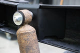 Side view of Rust Buster Rear Upper Shock Mount For 1995-2004 Toyota Tacoma RB7109 installed to the frame rail