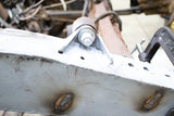 Close-up, opposing side view of Rust Buster Rear Upper Shock Mount For 1995-2004 Toyota Tacoma RB7109 installed to the frame rail